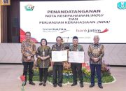 Bank Sultra Teken MoU dan NDA dengan Bank Jatim Disaksikan Sekda Sultra